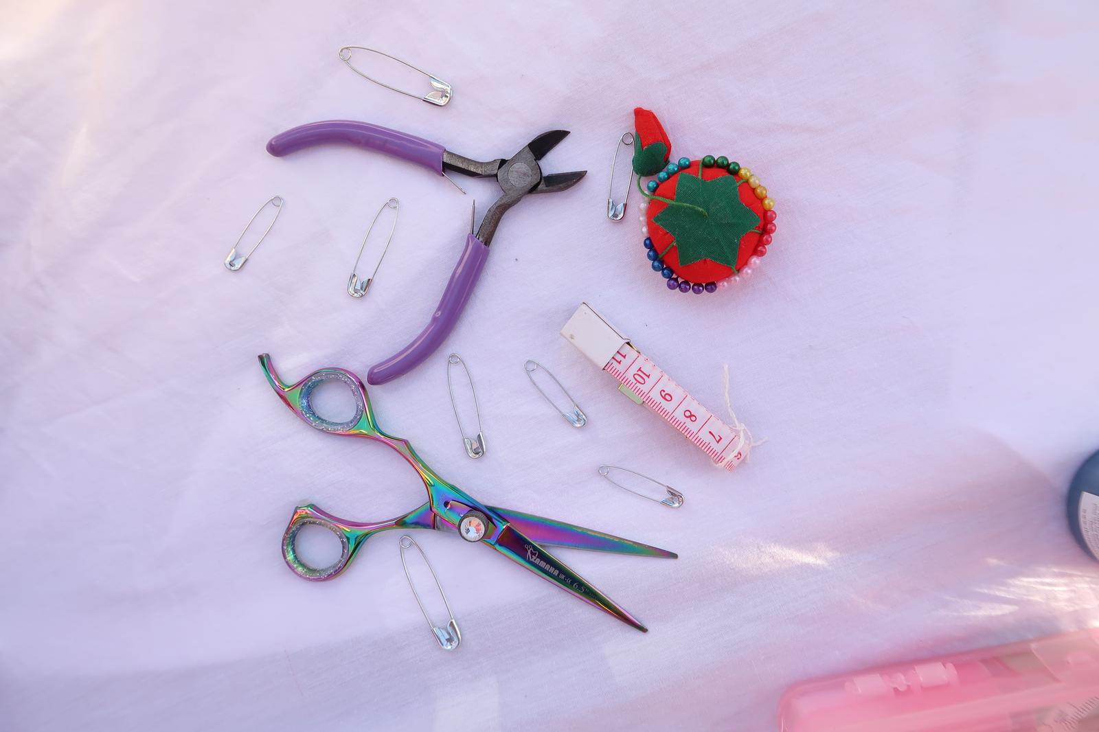 Sissors surrounded by art supplies